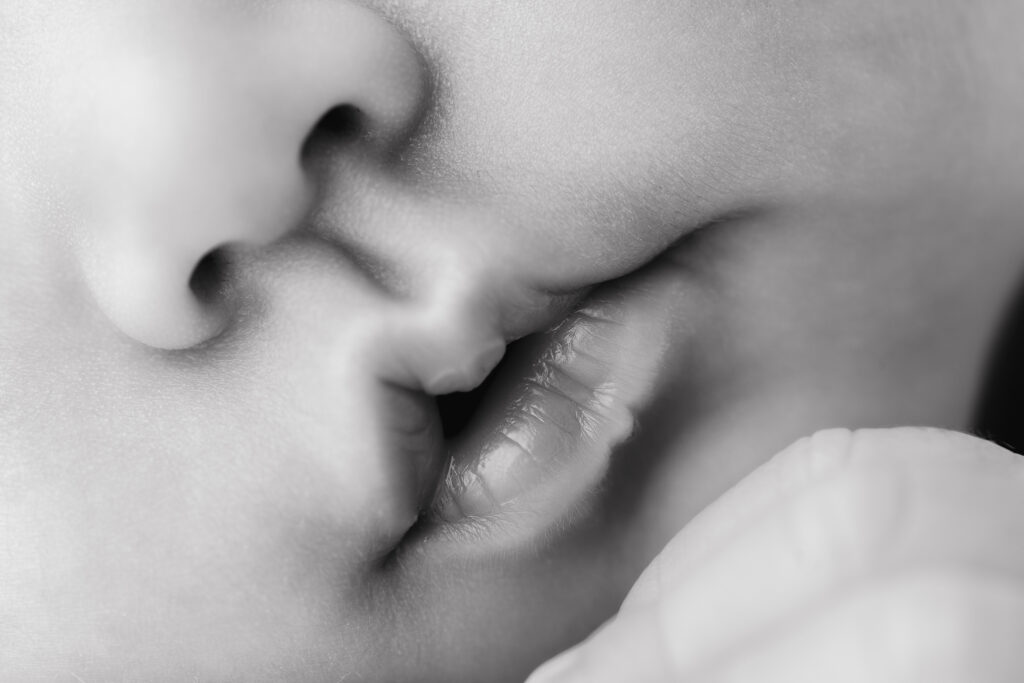 Close-up of two lips touching
