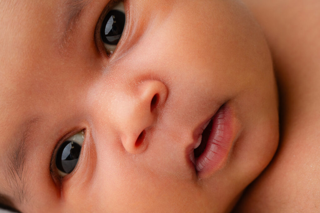 Sacramento newborn photography in natural light studio