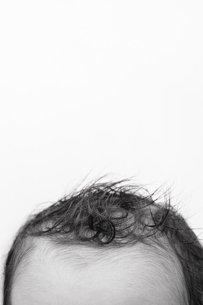 Timeless newborn photography in Sacramento focused on connection, softness, and tiny details