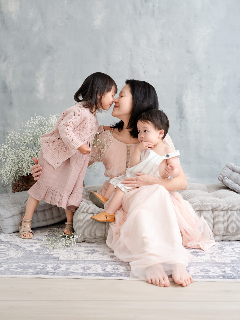 Sacramento Motherhood Photography Event Portrait of a mother with two small children