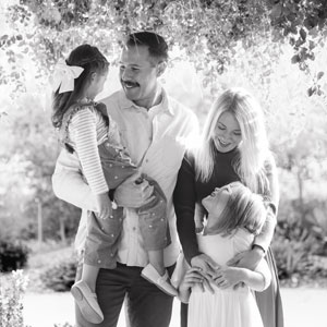 Family portrait in a natural setting.